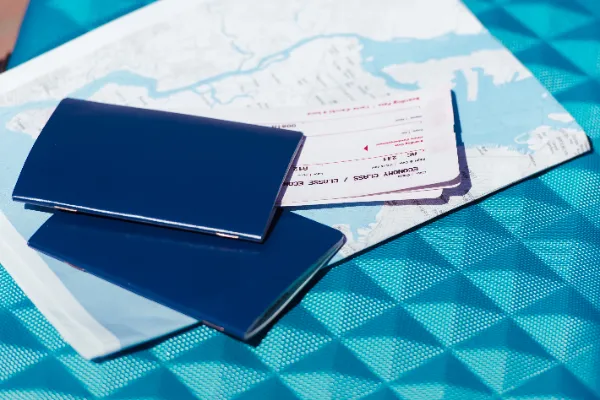 passports, tickets and a map on a table