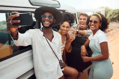 Friends taking a selfie on a road trip