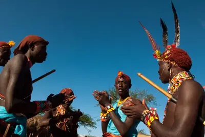 Tribal community engaged in a cultural celebration